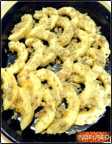 Roasting the delicata squash with topping. 