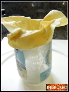 Make a cone and put it in a microwave safe glass. Drape the edges of the papad over if you want a flower shaped papad