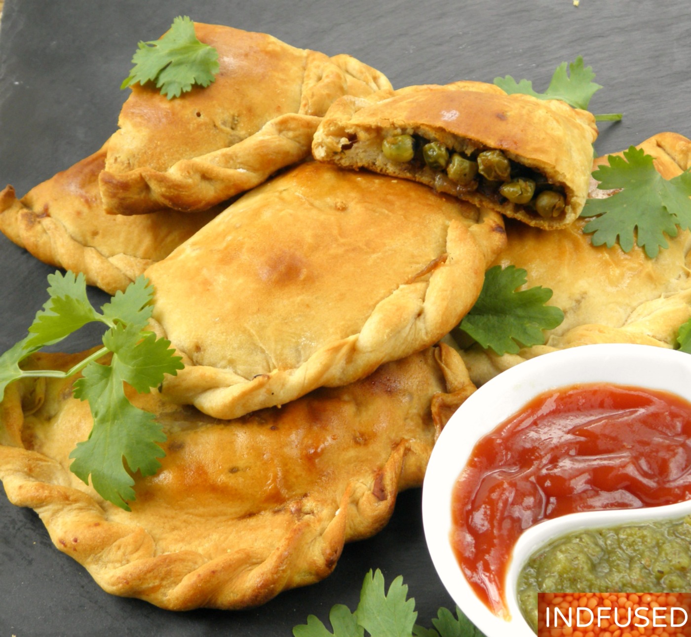 Indian Fusion hand pies with savory green peas, onion and cheese filling made easy using Pillsbury biscuit dough!