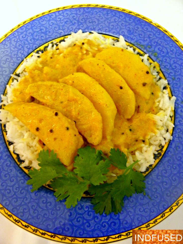 Indian Konkani style potato curry with coconut milk eaten with rice in a rice bowl!