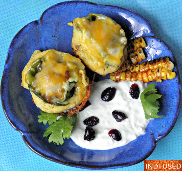 Indian fusion recipe for figure friendly, savory, crispy Chili Rellenos Bocados served with cotija cheese sauce!