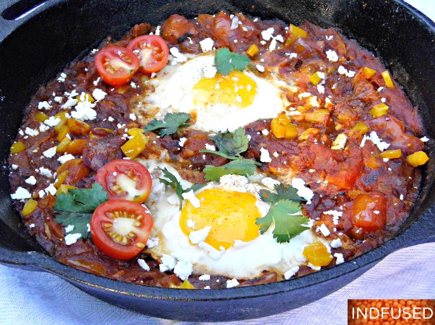 Indian fusion recipe for Shakshuka with #Hunts tomato paste, #MTR garam masala, #eggs, and #Athenos feta cheese