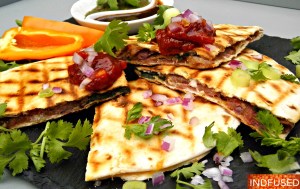 Quick and easy, vegetarian, Indian fusion recipe for samosadilla. All the taste of a samosa without the deep frying!