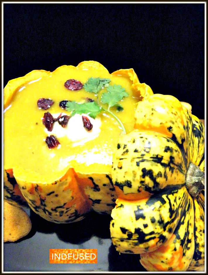 Carnival squash makes such a pretty container for this Thanksgiving soup!